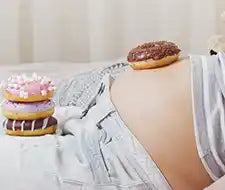 schwangerer Bauch Donuts Heißhunger